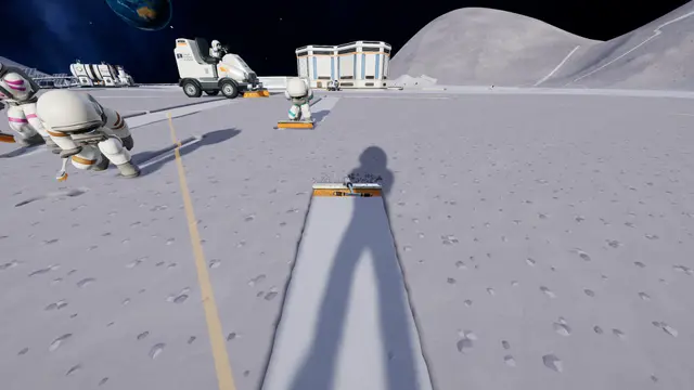 Moon Sweepers player sweeping a clean strip through lunar dust with a brush, moon base and vehicle behind